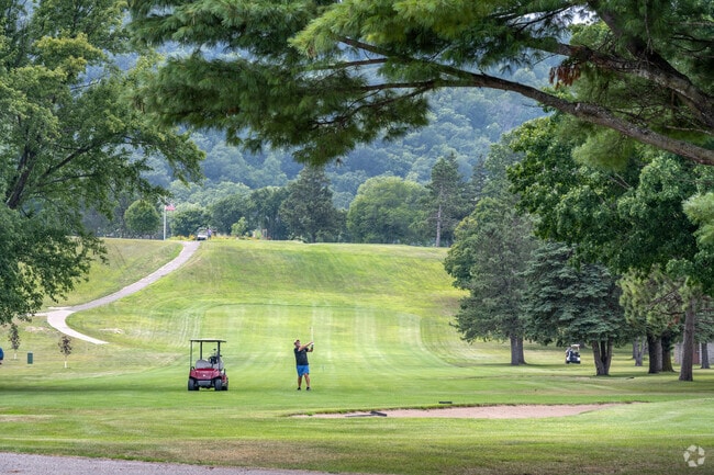 Play through the rolling hills of green at Lake City Golf.
