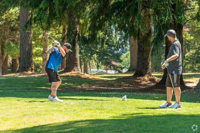 Village Greens Golf Course in Parkwood offers a pristine setting for golfers of all levels.