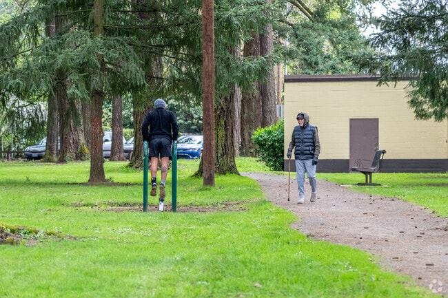 Residents of Northeast Neighbors enjoy friendly conversation at Englewood Park.