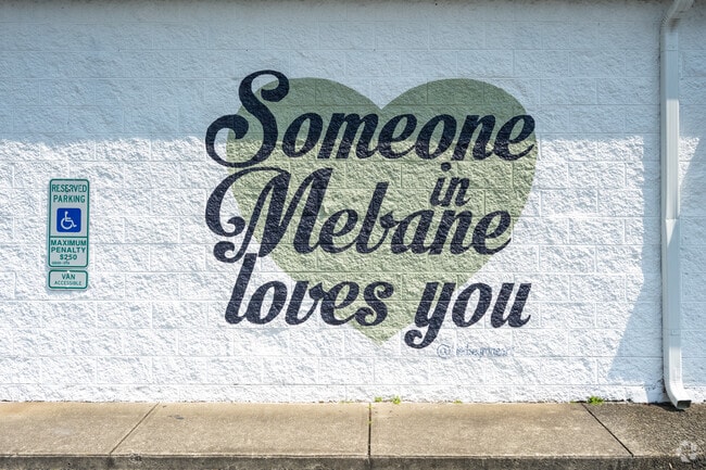 Bold murals in Mebane offer messages of love to residents and visitors alike.