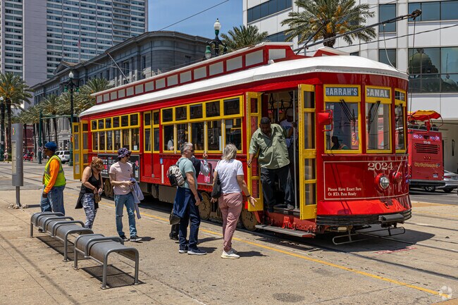 The red Canal St streetcar is popular with tourists and residents alike in the New Orleans CBD.