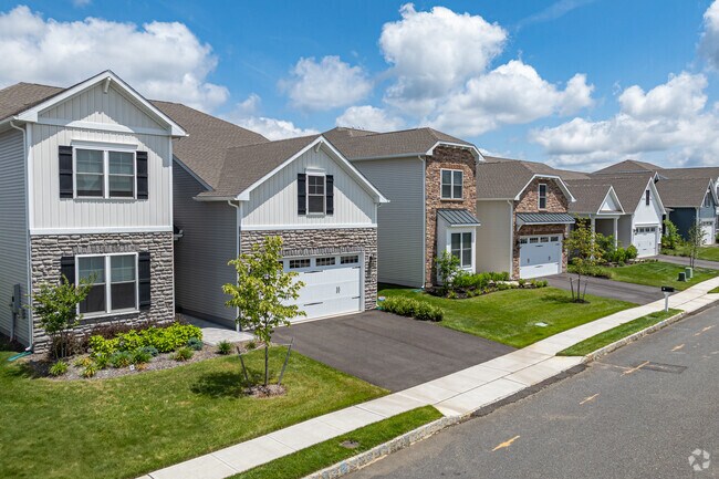 Craftsman-style single family homes are a popular architectural style in Manalapan Township, featuring 3 or 4 bedrooms, attached garages.