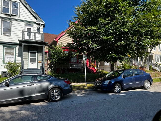 Lower unit of house with red trim. Located on quiet well maintained block.