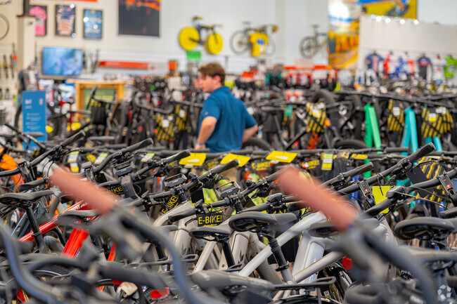 Fairway Oaks residents shop for bikes for the bike trials at Action Sports.