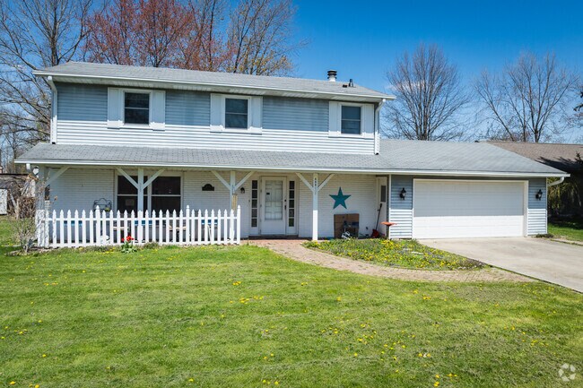 This Sky Park house features a covered porch to enjoy the outdoors in rain or shine.