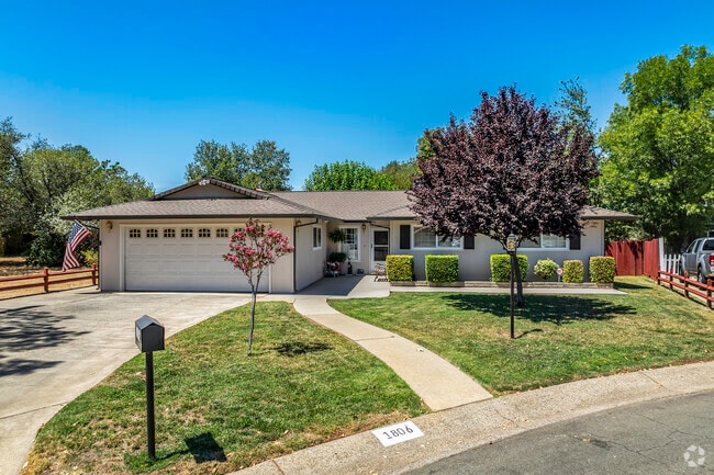 This 1980’s era ranch-style home, in Mistletoe, has simple clean landscaping.