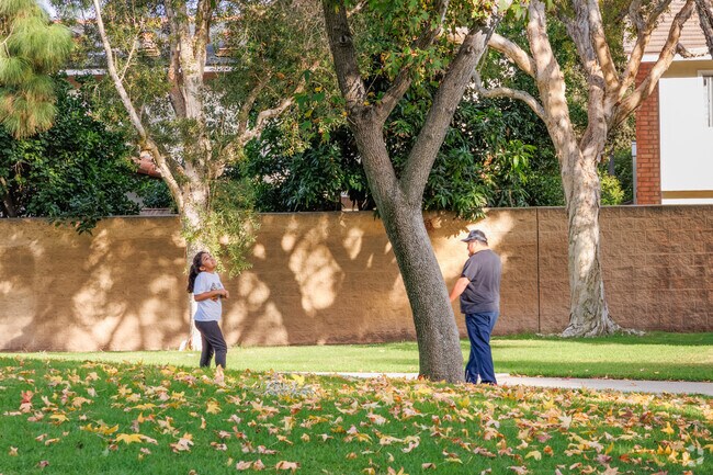 Artesia residents enjoy an afternoon at Rosewood Park.