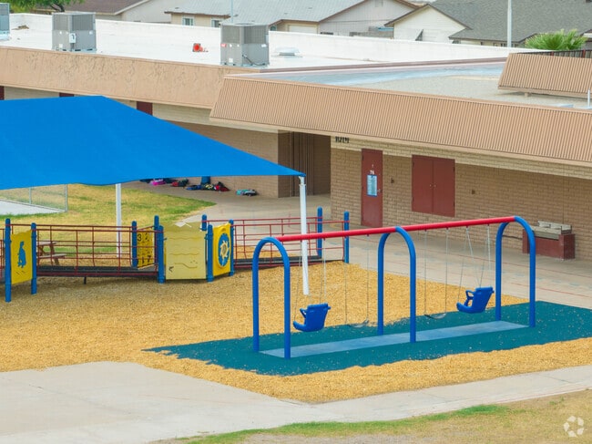 Palm Lane Elementary School also has a swingset on campus.