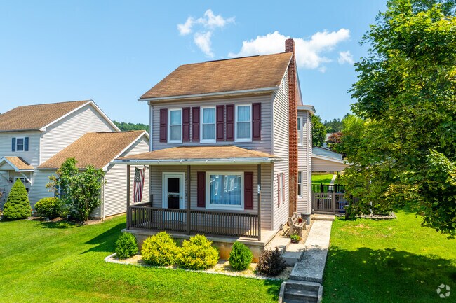 Bowmanstown Colonial Revival with balanced windows and a front porch.