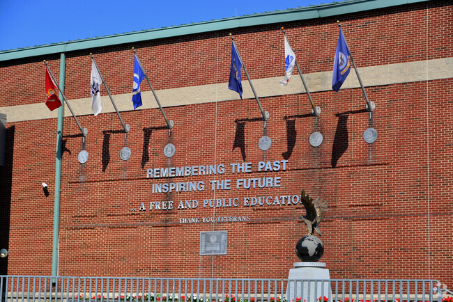 Long Branch High School honors veterans with a memorial on the side of the school.