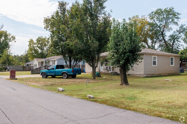 The streets in Oak Park are lined with trees.