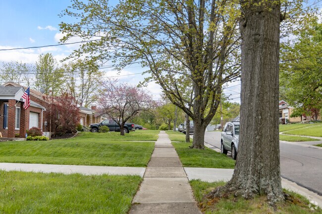 Walk on the treelined sidewalks in the peaceful neighborhood.