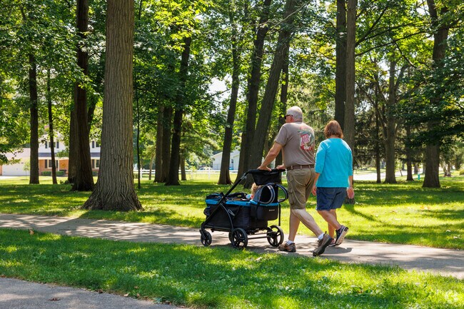 Visitor's enjoy a stroll along Schaefer Park's shaded walking trails.