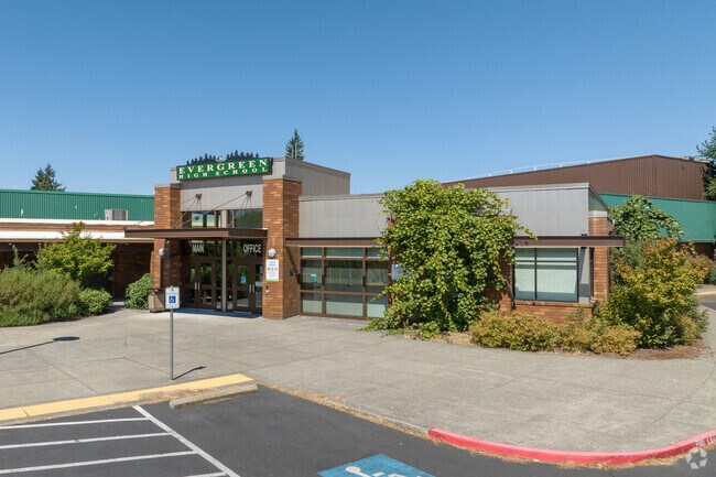 Evergreen High School welcomes students with its main entrance in Image.