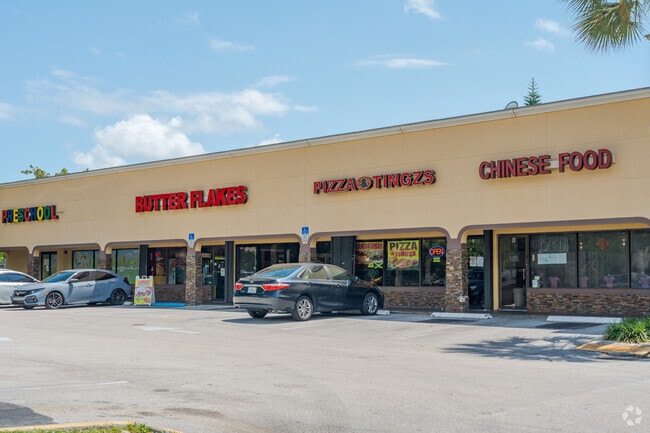 Local restaurants like Butter Flakes, serving Jamaican cuisine, can be found nearby The Woodlands.