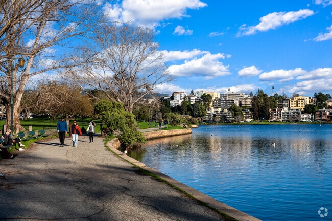 Harrison St. residents enjoy a walk by the lake at Lakeside Park.