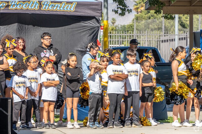 Children eagerly anticipate their performances at the Annual Cinco de Mayo Celebration.