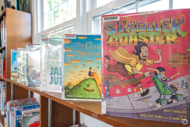 Kids fall in love with reading at the East Falmouth Public Library.