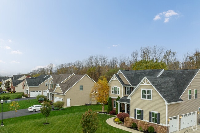 A row of modern homes in a newly developed neighborhood in Orchard Park, NY.