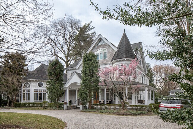 Victorian style house with large driveway in Englewood, NJ.