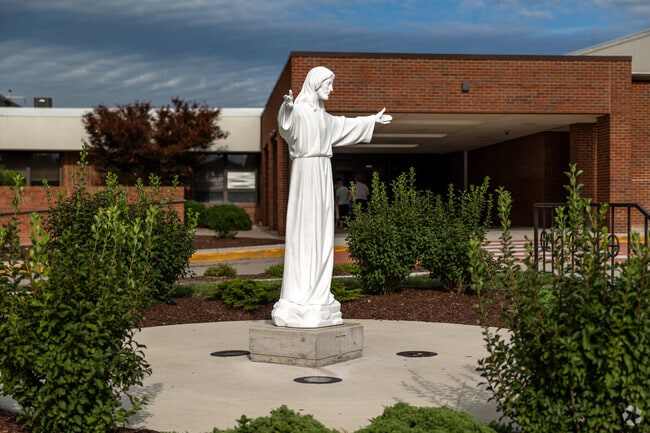 There is a beautiful statue by the entry of Christ the King School.