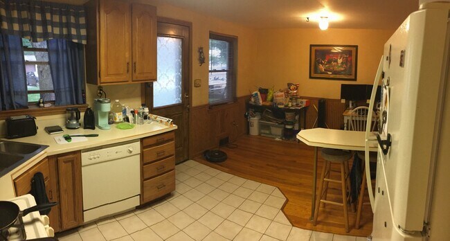 Back door, 2 windows to backyard. Breakfast nook has 3 stools