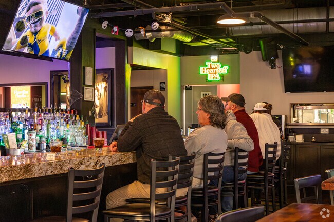 The Local 701 in Charleswood has great happy hour deals and down to earth pizza and wings.