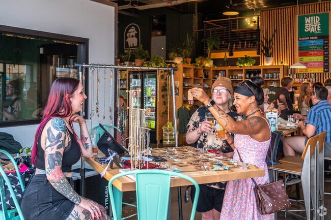 There are vendors at the Duluth Plant Swap at Wild State Cider in Lincoln Park.