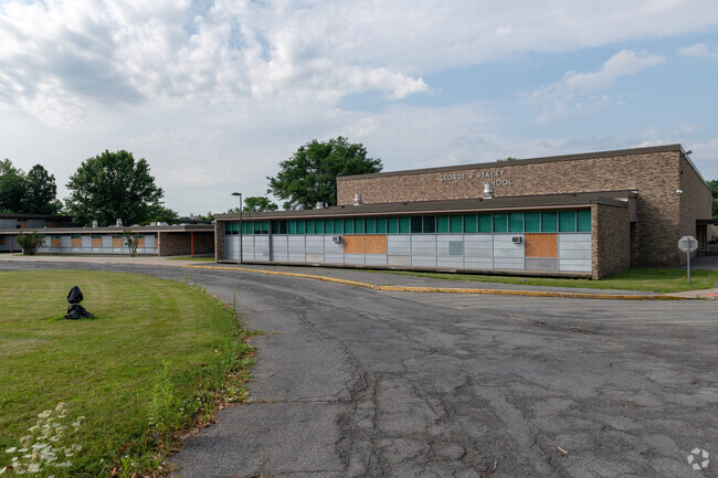 Closed since 2021, the George R. Staley Upper Elementary School has been securely boarded-up.