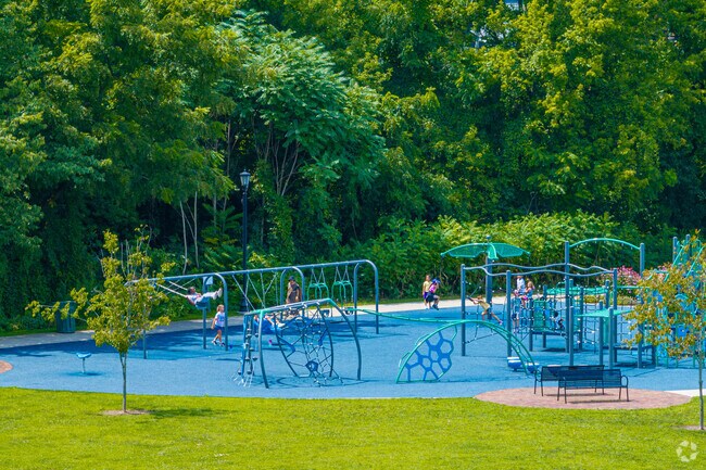 Near Northwest children head to the playground at Leeper Park.