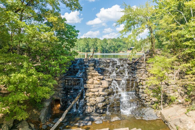 Chewacla State Park features a popular waterfall that's just a short hike away, conveniently located near the Grove Hill neighborhood.