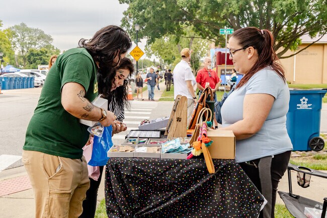Handcrafted jewelry catches shopper's eyes during Rock 'N Wheel in Addison.