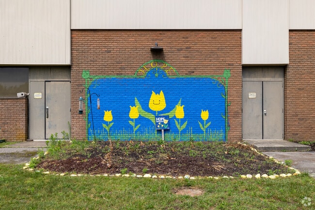 A playful mural at the entrance of Plymouth Community Intermediate School in Plymouth.