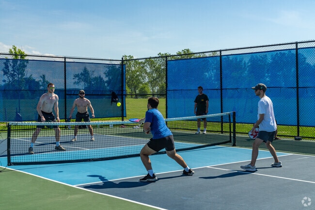 Friends gather at Glasgow Park for exciting games of pickleball.