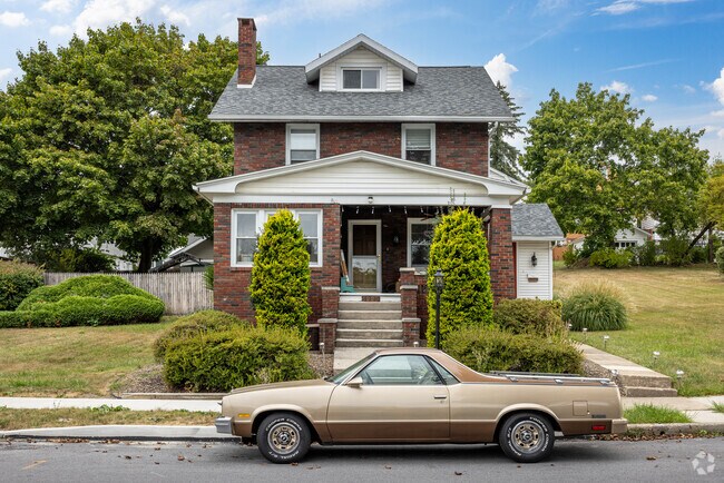 Historic homes in various styles and conditions line Calvert Hills’ gridded residential streets.