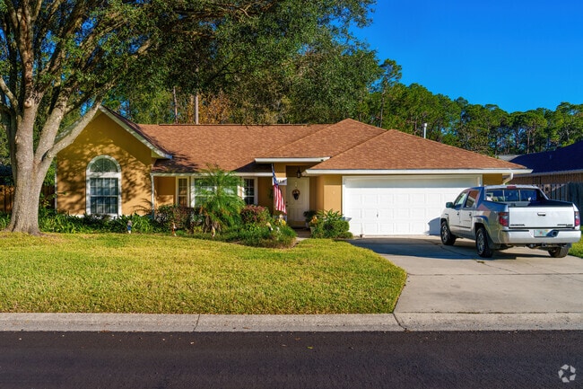 A beautiful color choice adds character to this single-family home in Sutter's Landing.