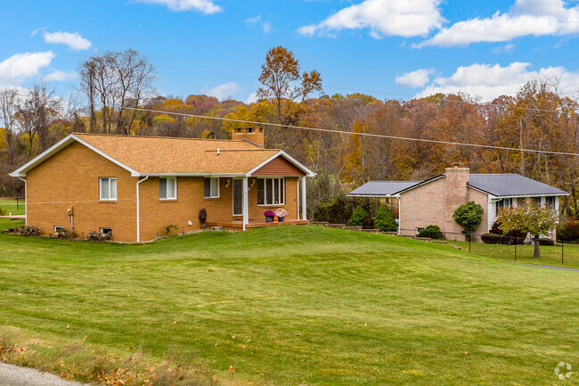 Ranchers sit aside split level homes in Franklin on large lots immersed in nature.