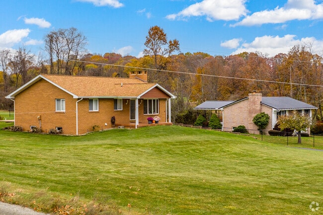 Ranchers sit beside split level homes in Franklin Township, on large lots immersed in nature.