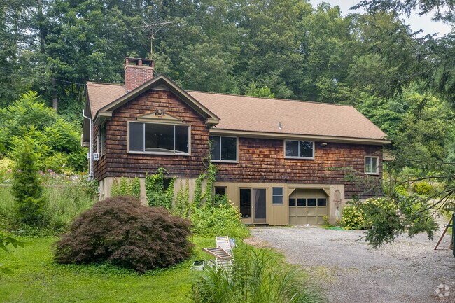Modest Cape Cod style home located on Church Hill Road in Redding.