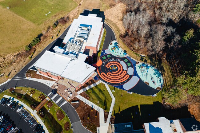 Amesbury Elementary School in Amesbury, has a unique and colorful play area for students.