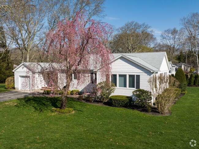 Beautiful ranch style homes and single-family homes stand on large tracts of land in Calverton.