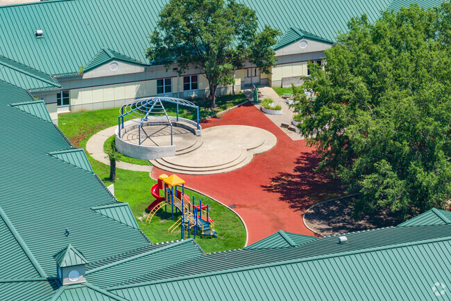 Shelby Oaks Elementary School features a courtyard playground for the students to enjoy.