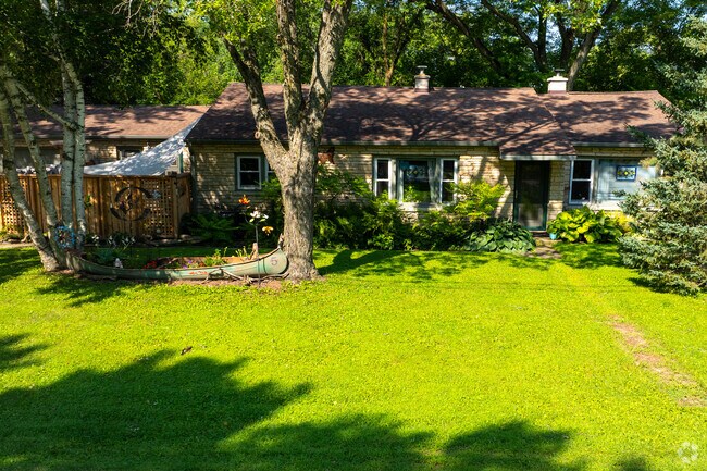 In Dousman, the streets reflect a peaceful exurban charm—ranch-style homes framed by small front gardens and picket fences, lining lanes that quietly stretch on without sidewalks.