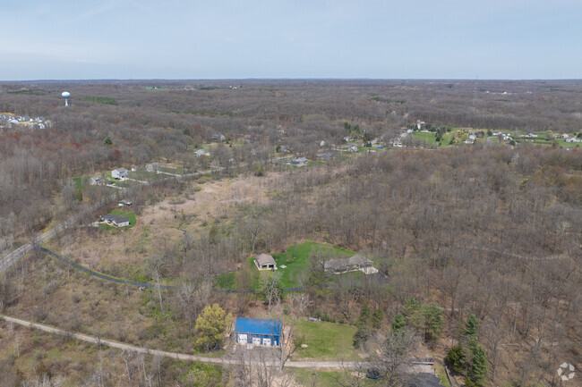 Lowell Township is mostly heavily wooded areas with farms covering the southern edge.