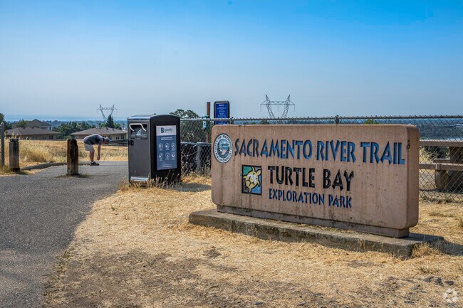 This runner is stretching out before his trek at Bluffs’ Sacramento River Trail.