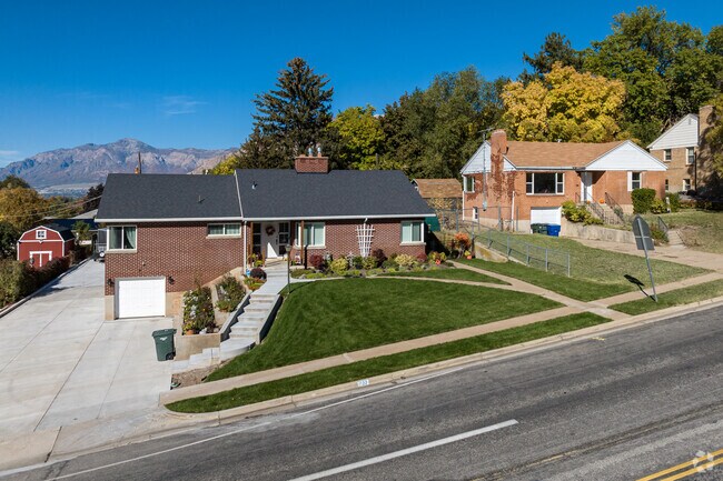 Brick homes with large yards line the street in Mt Ogden.