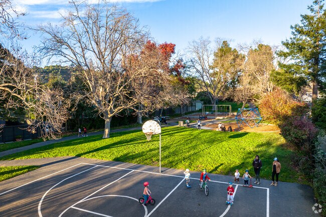 It's common to see kids playing a round of basketball with friends at Freeman Park.