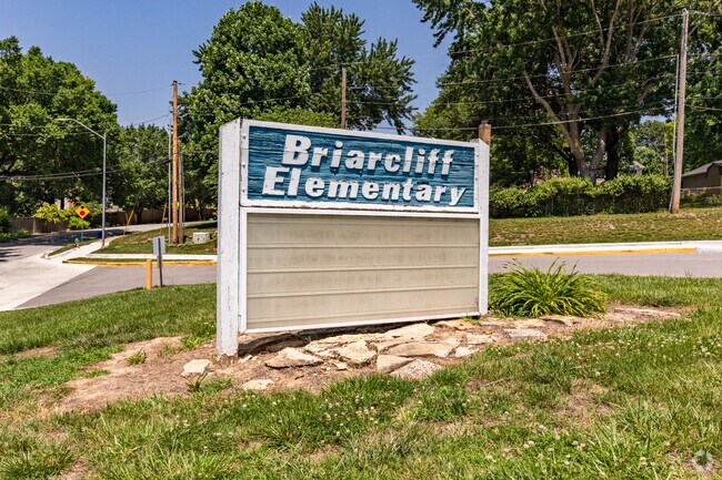 The classic Briarcliff Elementary sign stands at the corner, welcoming families to this longtime neighborhood school.