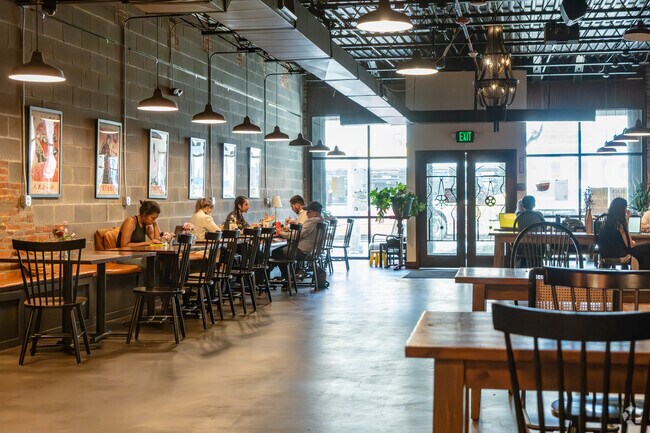 Red Emma's is a worker cooperative restaurant, bookstore, and community event space in Better Waverly.