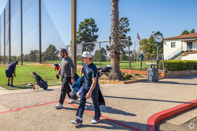 Play a round of golf at the 18-hole Recreation Park Golf Course.